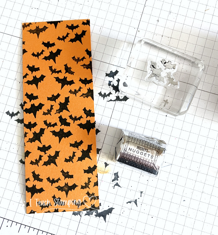 A strip of orange paper stamped with tiny bats to use in today's October 2022 Paper Pumpkin Alternative Ideas!